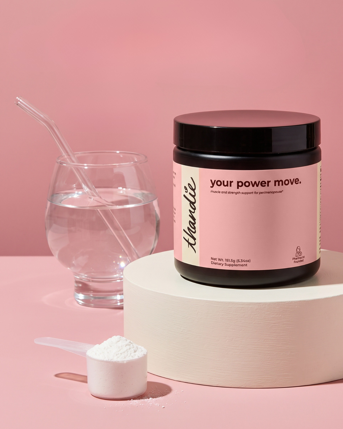 Thandie your power move creatine monohydrate powder jar with scoop and glass of water